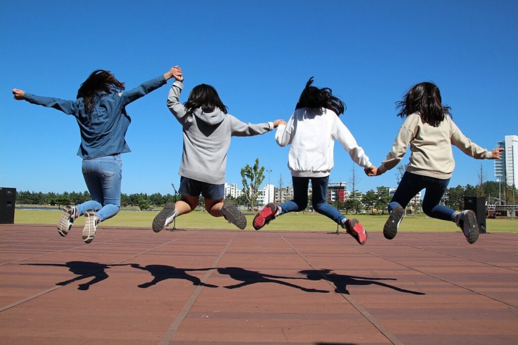 Children jumping in playground